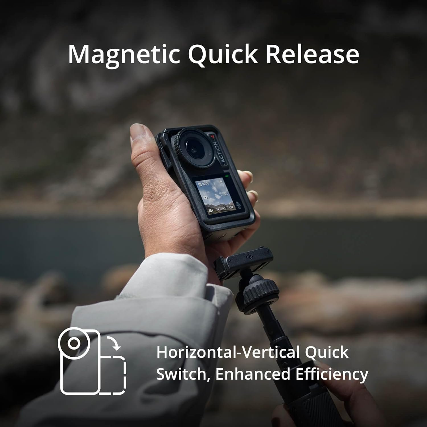 person hold DJI Osmo Action 4 Adventure Combo in hand near the river. 